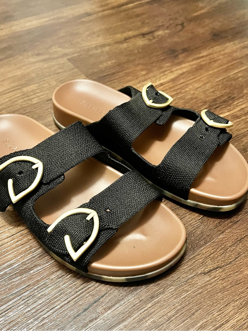 Rothy's Black Double-Strap Sandals with Gold Buckles and Tan Footbed